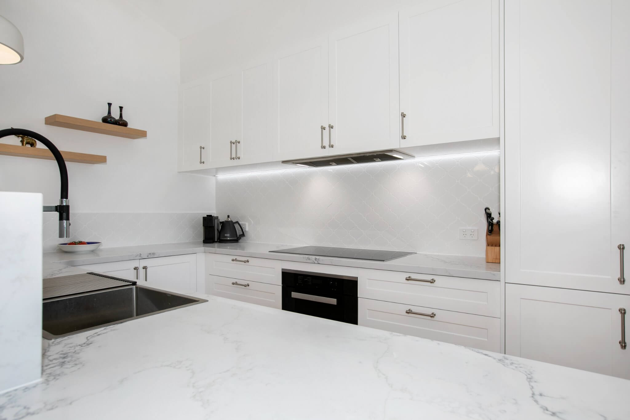 white on white kitchen renovation by Modern Kitchens Northside Brisbane