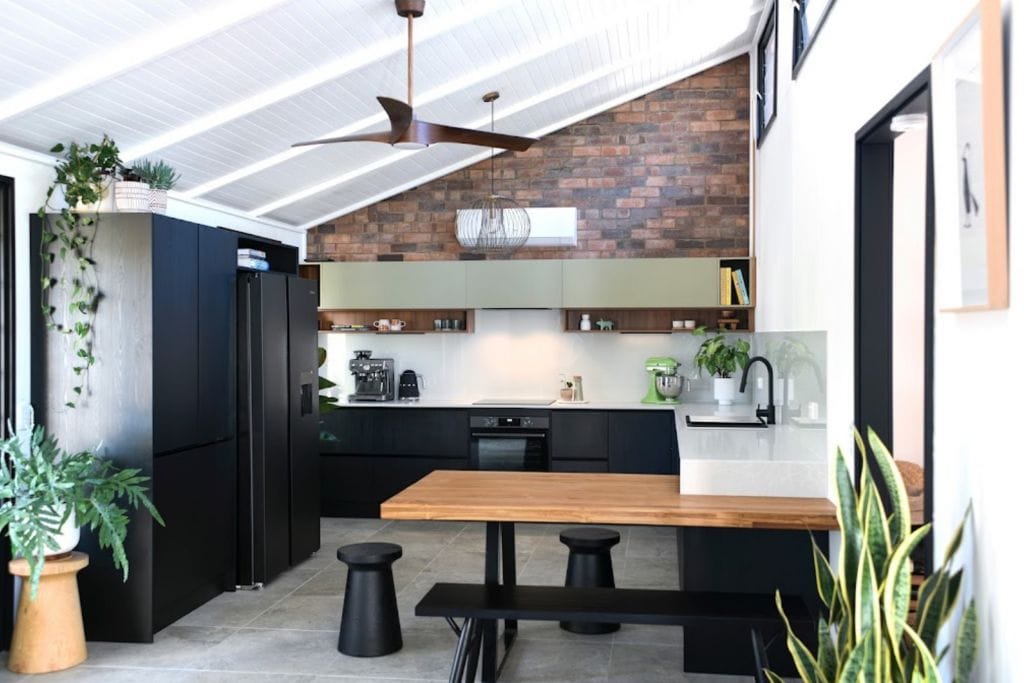 kitchen renovation with build in table coming from the kitchen bench area Brisbane