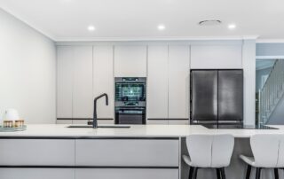 Kitchen renovation with island featuring drawers on both sides